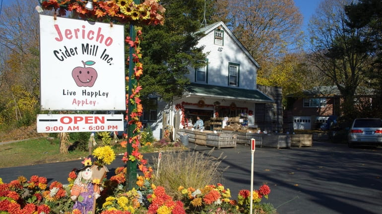 The Jericho Cider Mill attracts customers throughout the fall and...