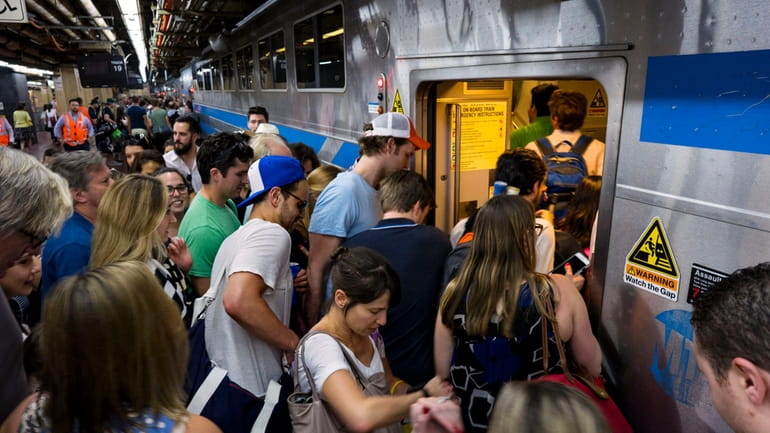 The LIRR's Cannonball train fills with passengers on the Friday...