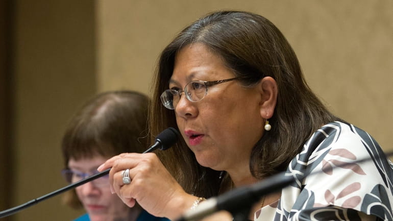 California Controller Betty Yee listens during a meeting on June...