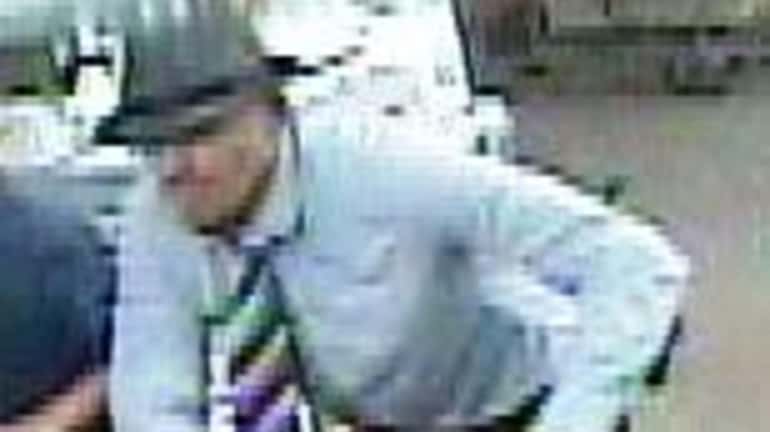 Police have released a surveillance photo of a man they...