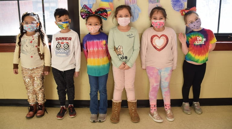 In Riverhead, students at Roanoke Elementary School wore colorful clothes...