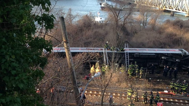 A Metro-North train headed to Grand Central Terminal derailed in...