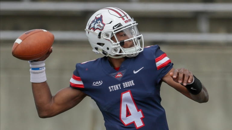 Stony Brook quarterback Tyquell Fields drops back to pass during...