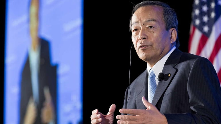 Takeshi Uchiyamada, chairman of Toyota Motor Corp., speaks to the...