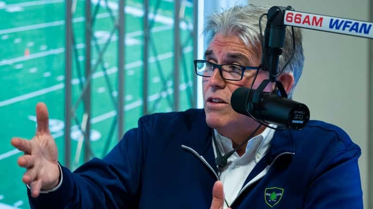 Mike Francesa talks with guest host Bill Simmons (not pictured)...