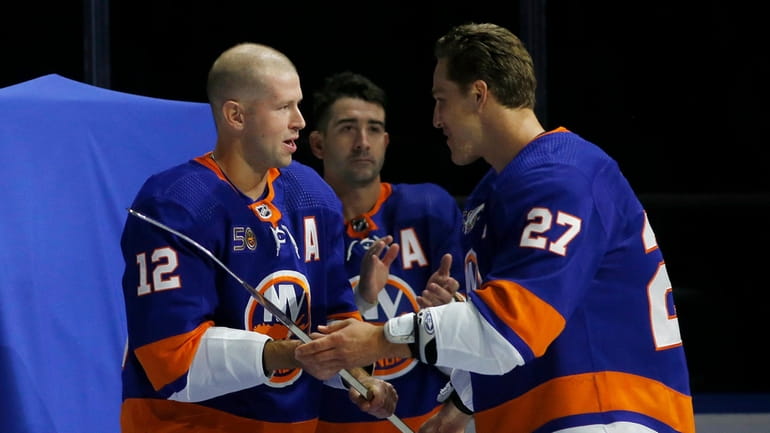 Josh Bailey #12 of the New York Islanders is honored...