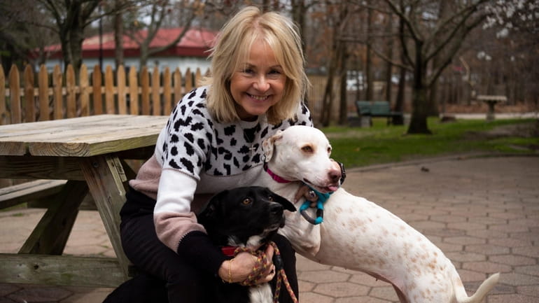 Southampton Animal Shelter Foundation Executive Director Patricia Deshong with Tito, left, and...