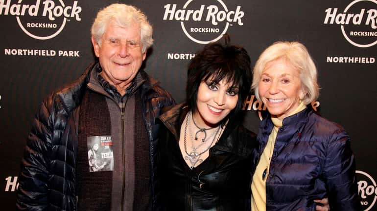 Joan Jett, center has been friends with concert promoters Jules, left, and...