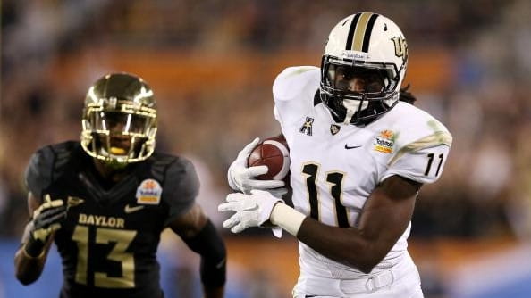 Breshad Perriman of the UCF Knights catches a pass for...