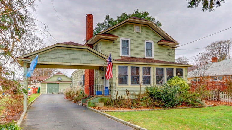 This four-bedroom Bay Shore house, built in 1900, was originally...