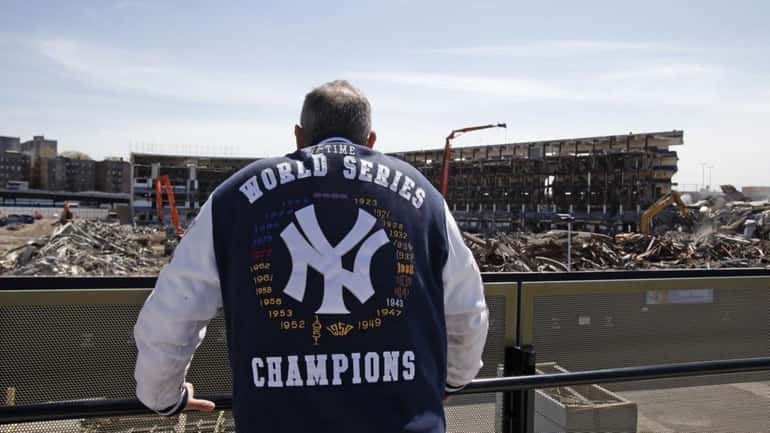 Yankees fan Bruce Dain of the Bronx, N.Y. looks over...