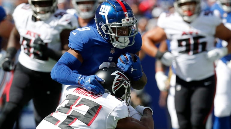 Sterling Shepard #3 of the New York Giants runs a...