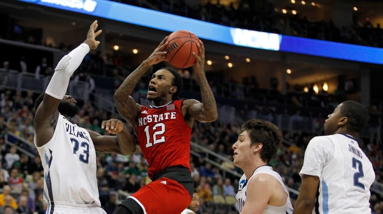 Anthony "Cat" Barber of North Carolina State puts up a...