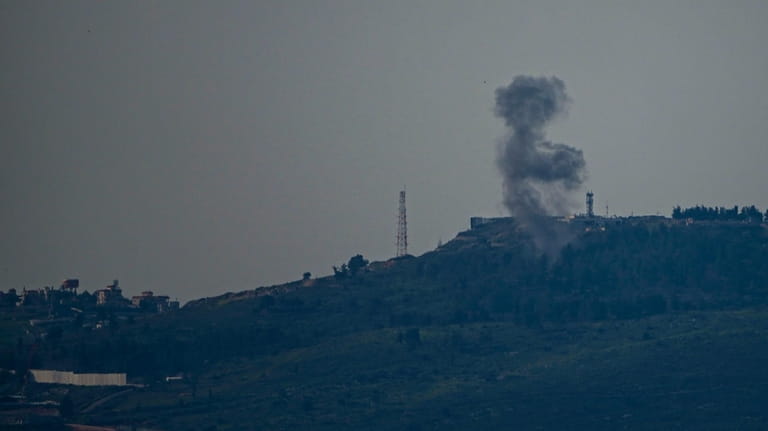 Smoke rises in northern Israel following a rocket strike from...