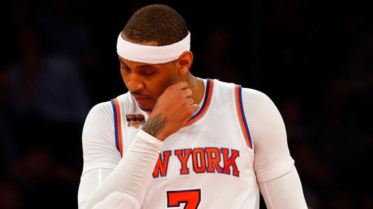 Carmelo Anthony #7 of the New York Knicks reacts in...