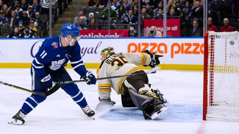 Marchand scores late in OT to lift Bruins to 4-3 win over Maple Leafs ...
