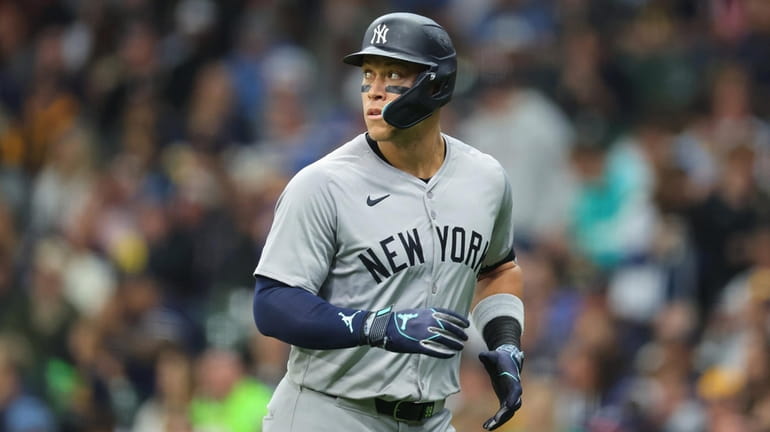 Aaron Judge of the Yankees walks to the dugout during...