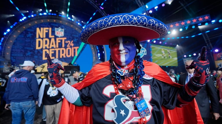 A Houston Texans fan attends the first round of the...